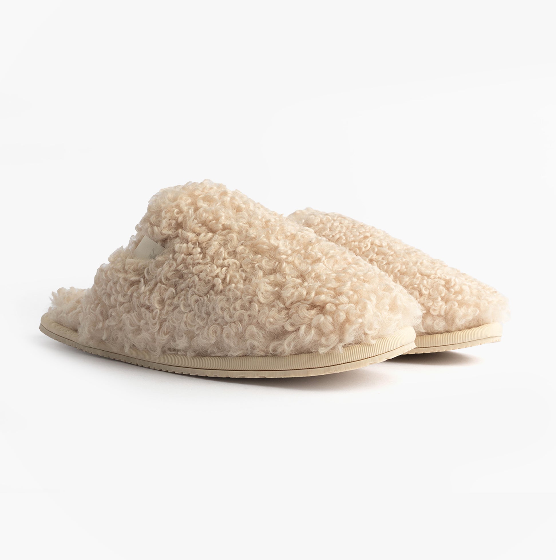 Calvin Klein CLOSE SLIPPER FUR Womens Slippers Marshmallow side view showcasing faux fur upper and lightweight sole.