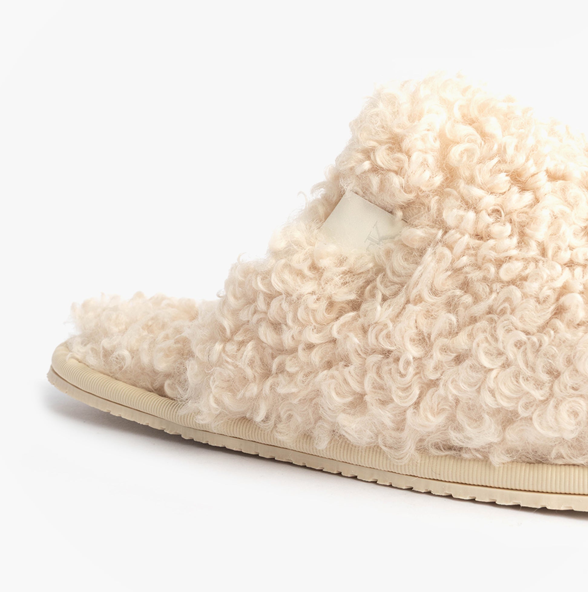 Calvin Klein CLOSE SLIPPER FUR Womens Slippers Marshmallow side view showcasing plush faux fur upper.