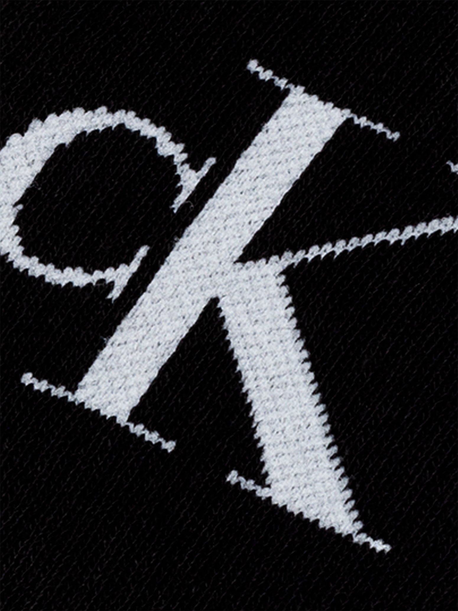 Calvin Klein 4 Pack Giftboxed Trainer Mens Crew Socks Black/White detail view of CK logo