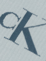 Calvin Klein 4 Pack Giftboxed Trainer Mens Crew Socks Blue Combo detailed view of CK logo embroidery on fabric.