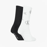 Calvin Klein 2 Pack Logo Trainer Womens Crew Socks Black/White front view showcasing black and white socks with logo design.