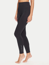 Calvin Klein GYM SIDE LOGO Leggings Black side view featuring mid-rise waistband and stretchy fabric.