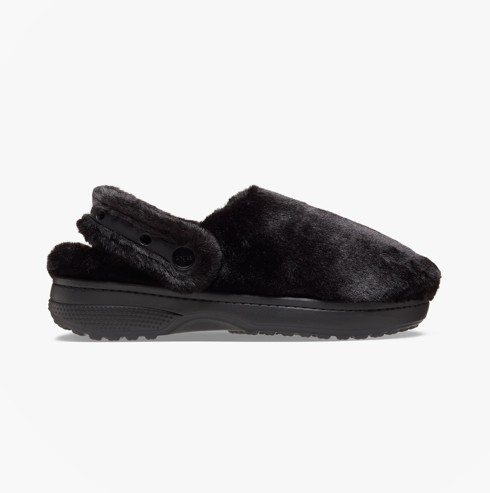 Side view of Crocs CLASSIC UNFURGETTABLE Womens Clogs Black with faux fur lining and padded footbed.