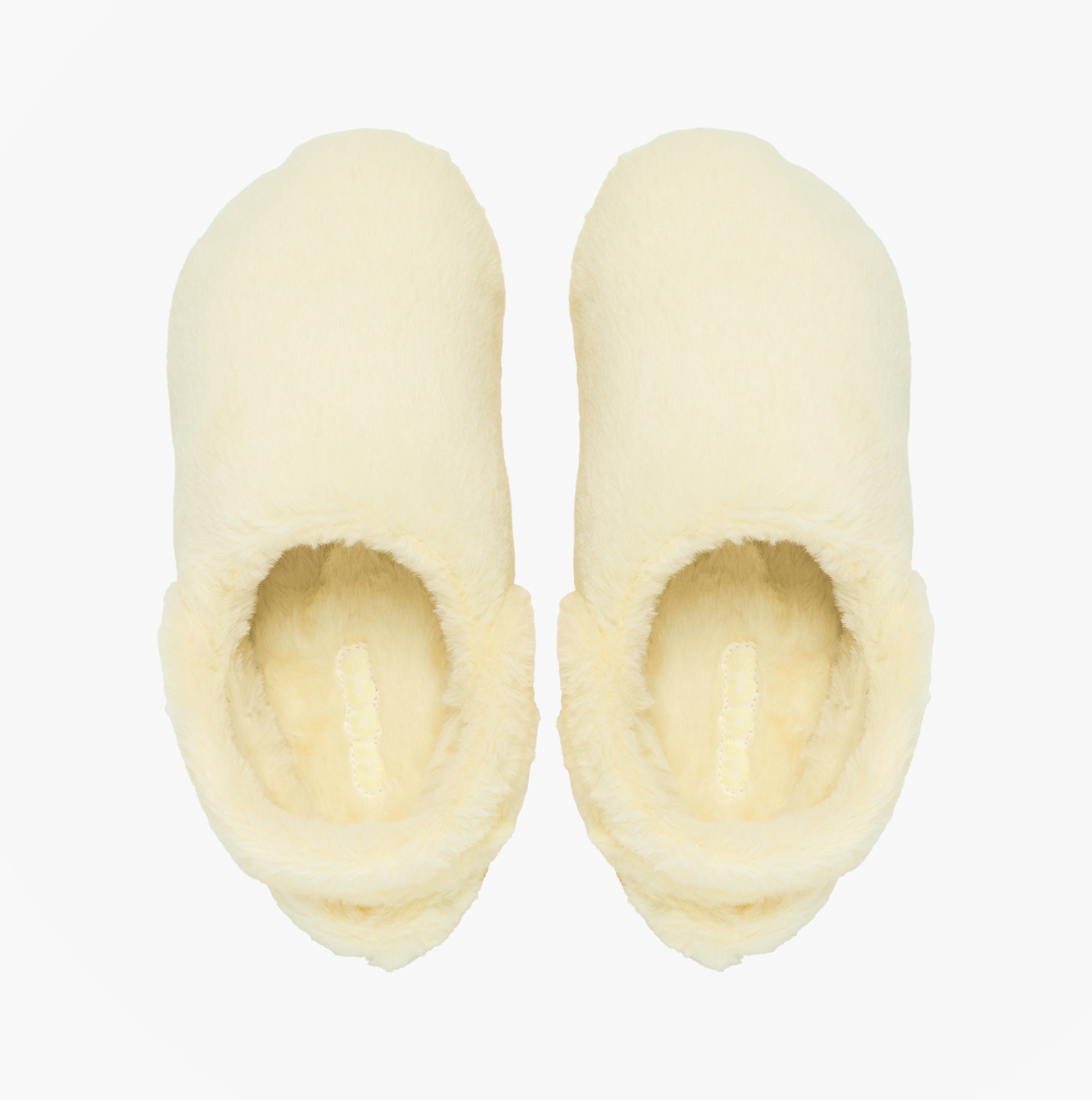 Crocs CLASSIC UNFURGETTABLE Womens Clogs Vanilla top view showing soft faux fur lining and comfortable slipper design.