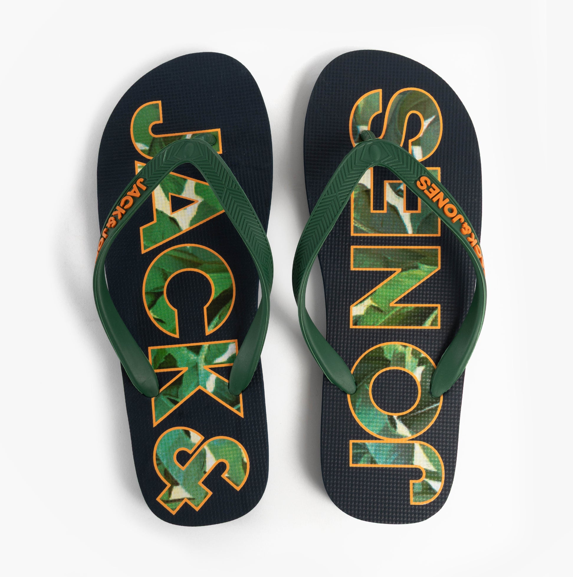 Jack & Jones LOGO PALM PRINT Mens Flip-Flops Navy Blazer top view with green straps and palm print on blue background.
