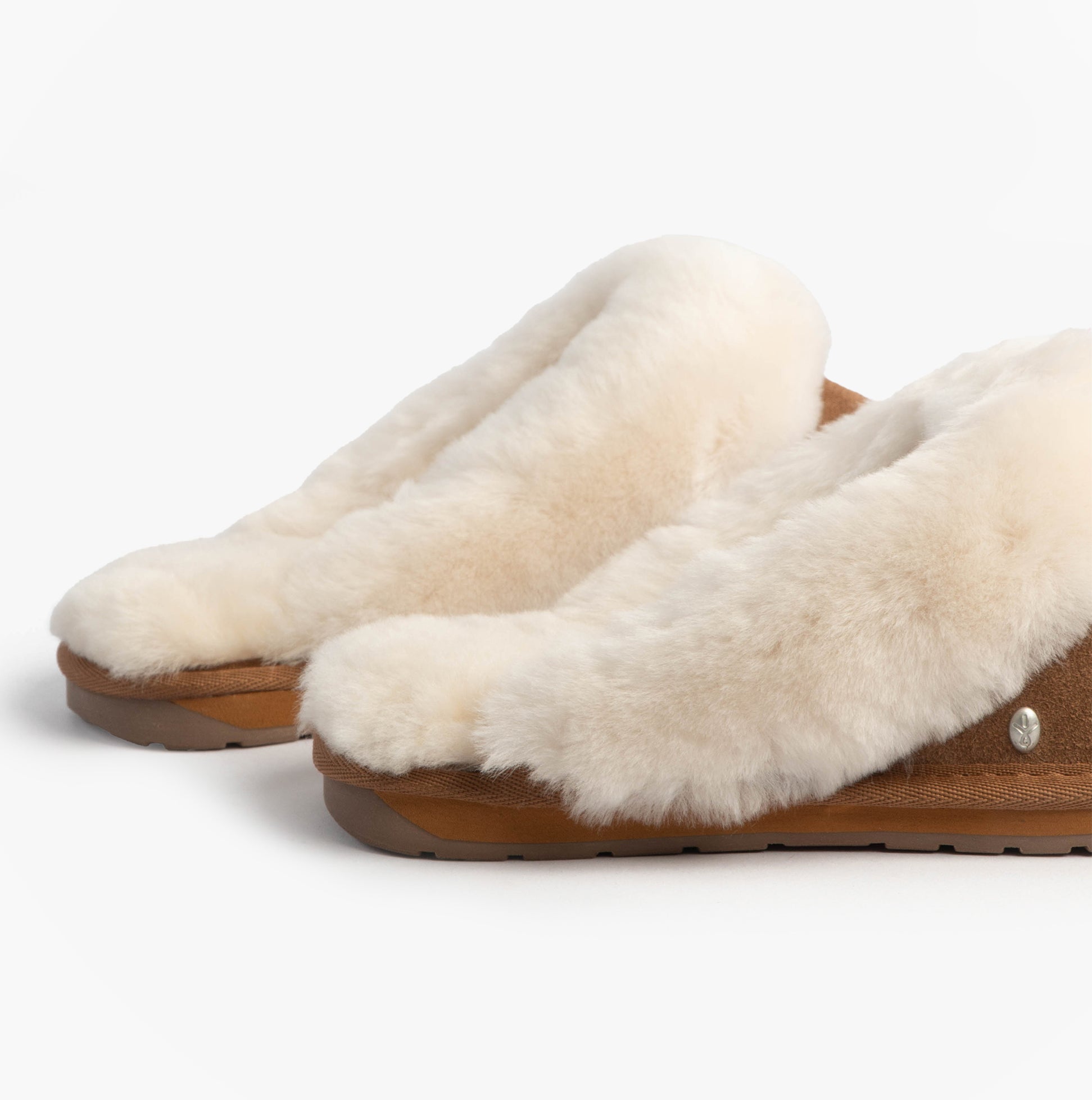 EMU Australia JOLIE Womens Mule Sheepskin Slippers Chestnut side view showing soft sheepskin lining and sturdy rubber sole.