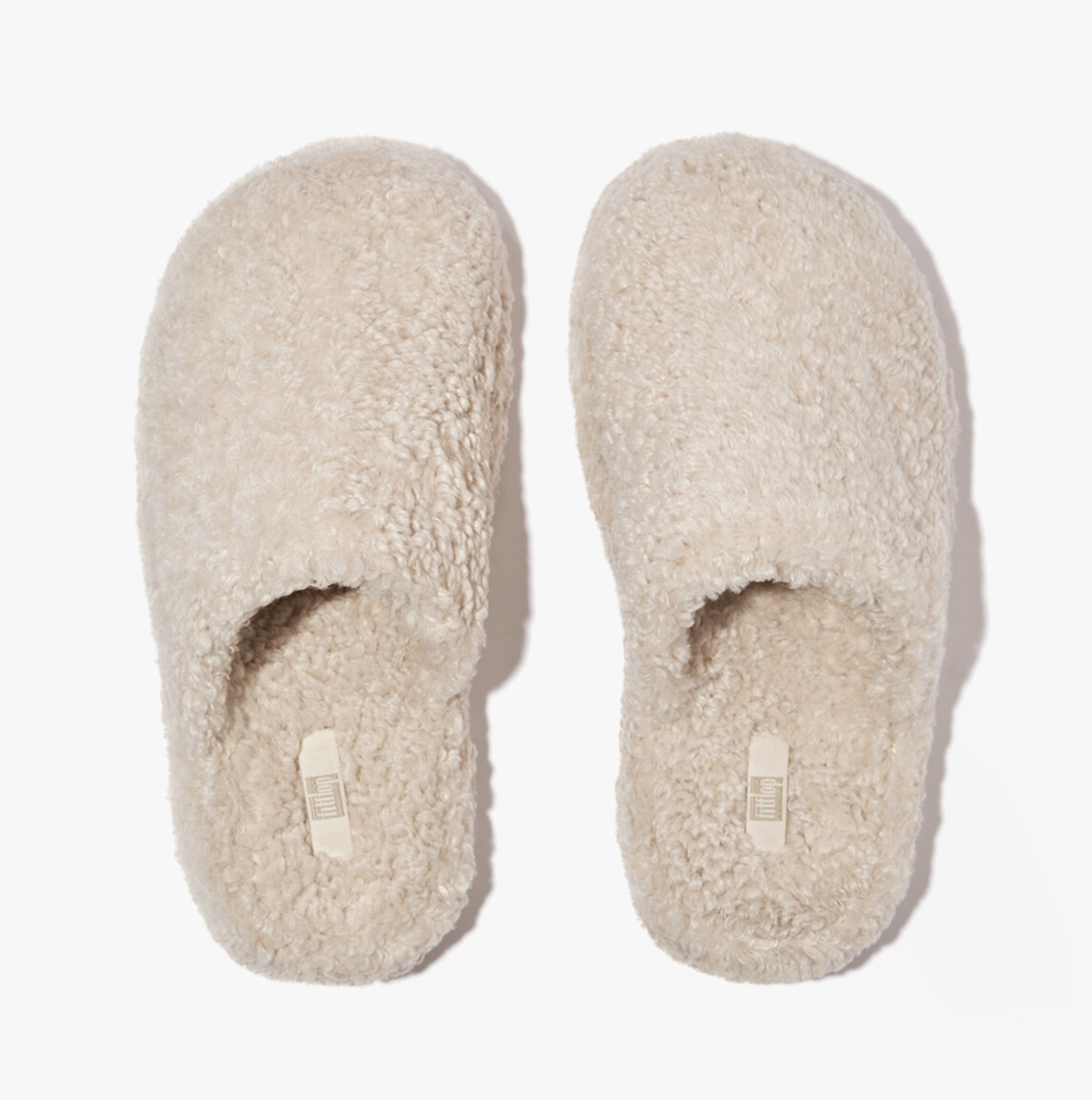 FitFlop iQUSHION D-LUXE Womens Mule Slippers Milk Ice top view showing soft textile upper and round toe.