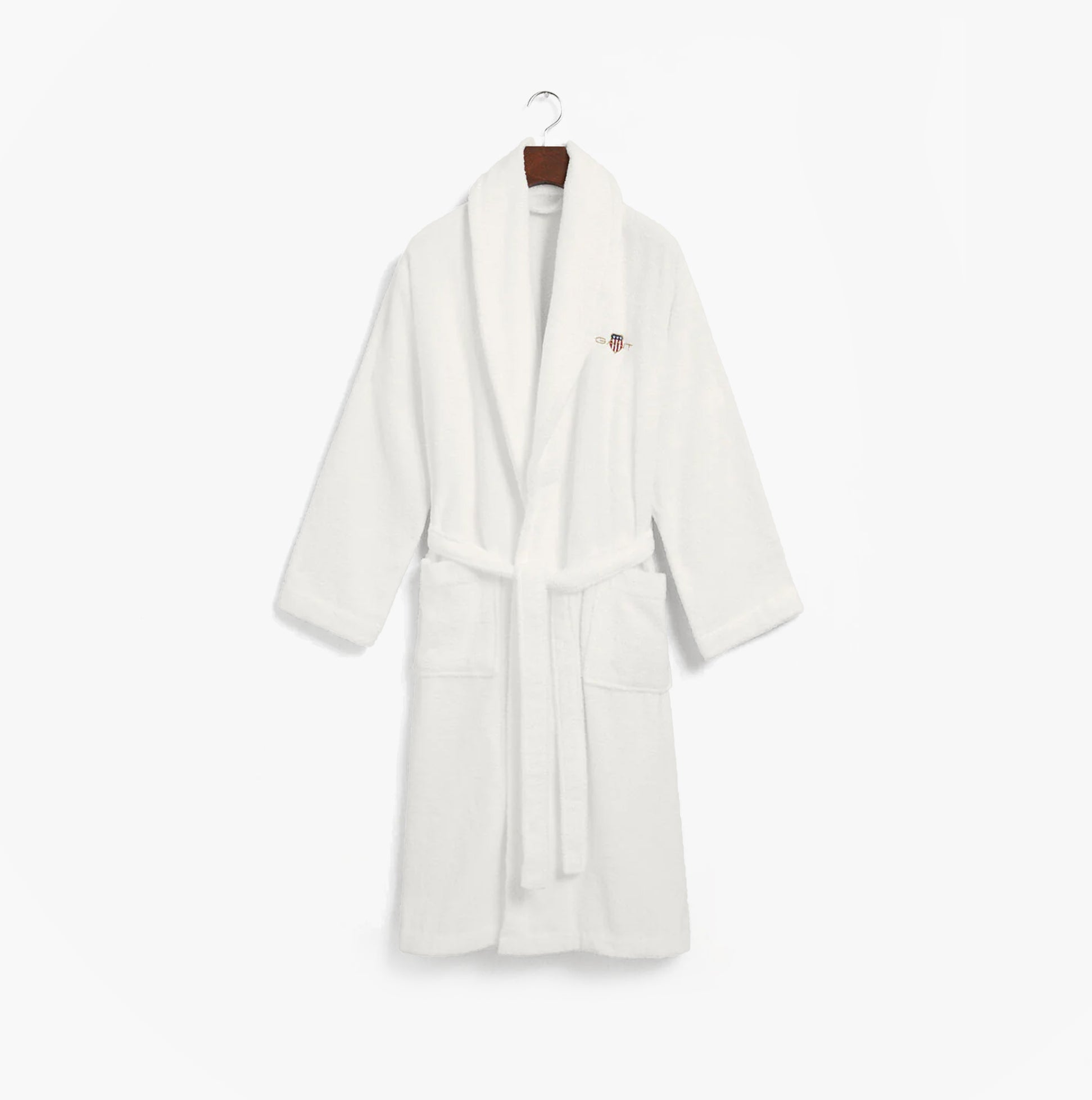 GANT ARCHIVE SHIELD TERRY Bathrobe White front view showcasing relaxed unisex fit, waist belt, and two front pockets.