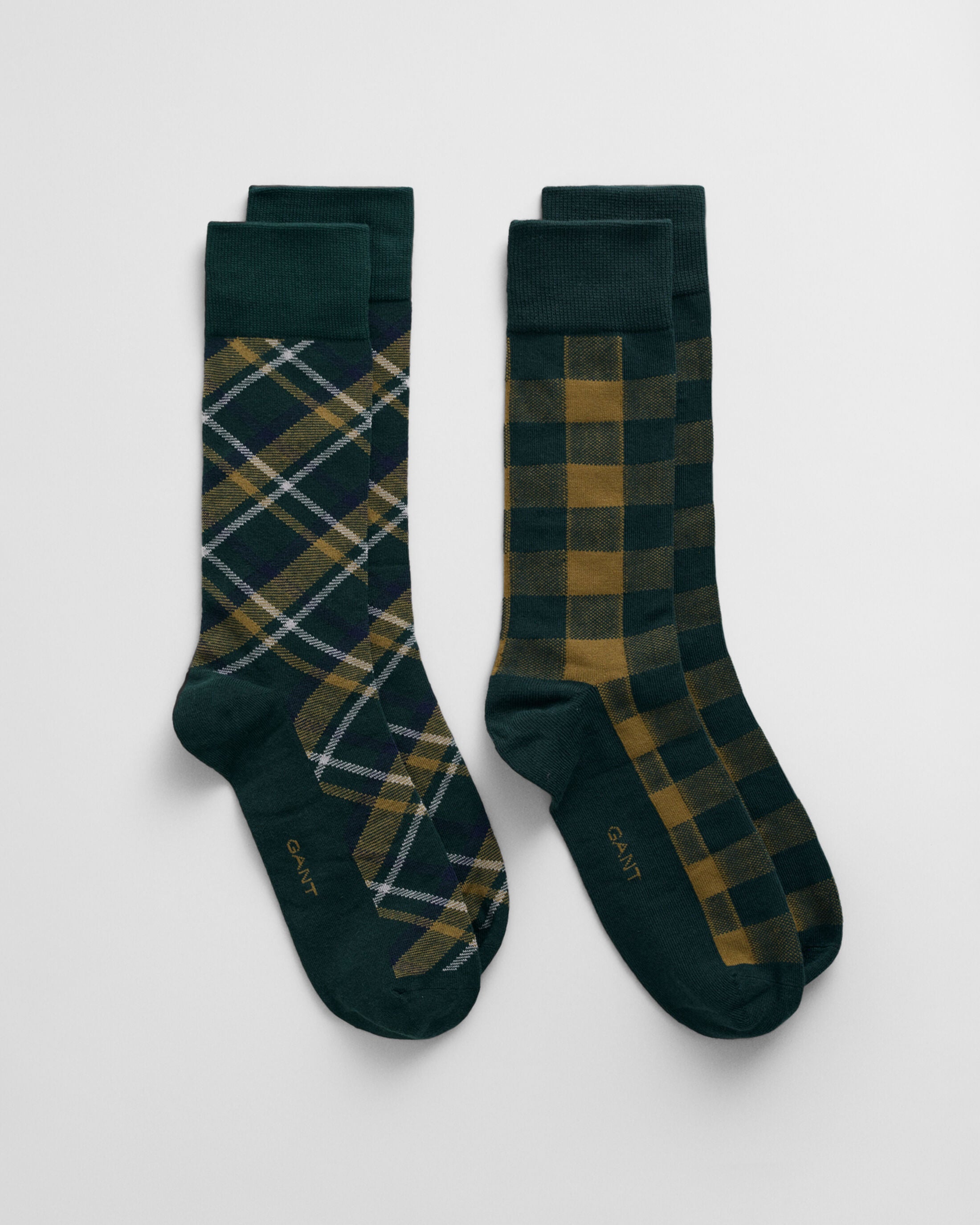 GANT CHECK SOCKS 2-Pack GIFT BOX Mens Tartan Green side view showing two designs, plaid and checked patterns in dark green tones.