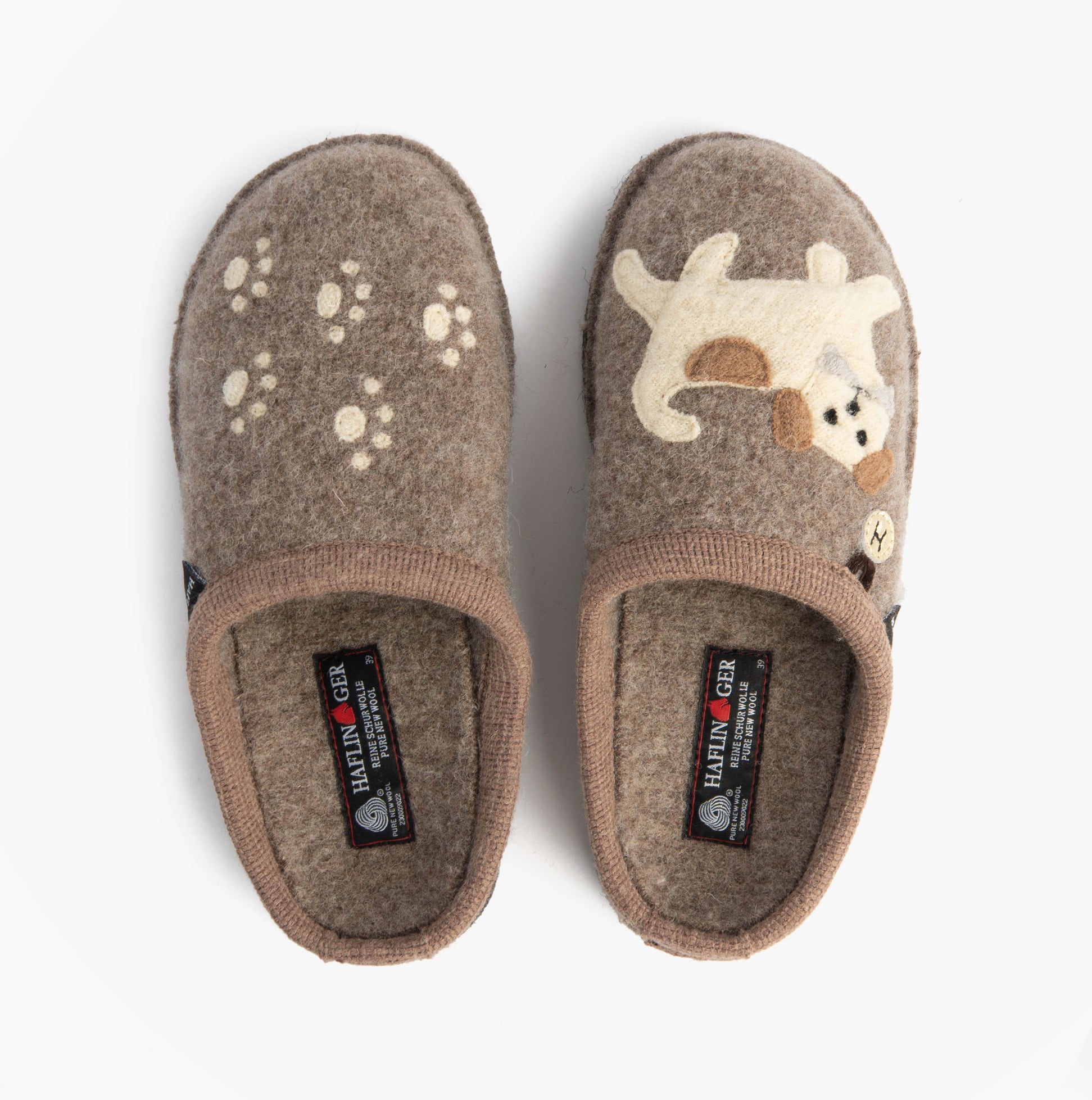 Haflinger FIDO Womens Slippers Beige top view showcasing slippers with dog design and paw prints.