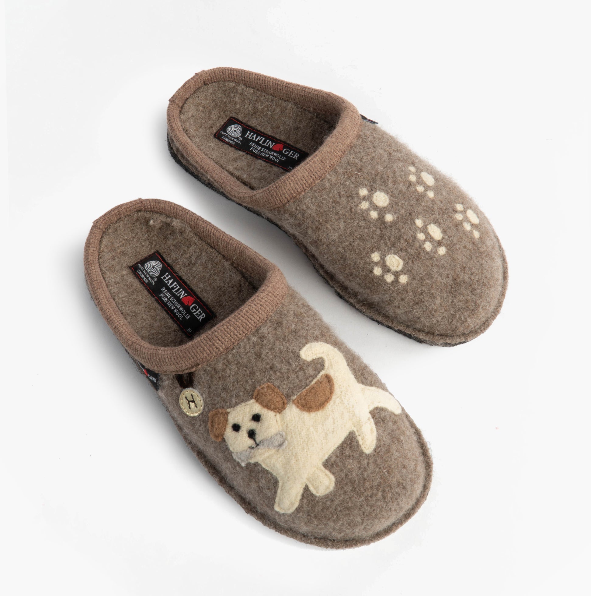 Haflinger FIDO Womens Slippers Beige side view featuring dog design and paw prints on upper textile.