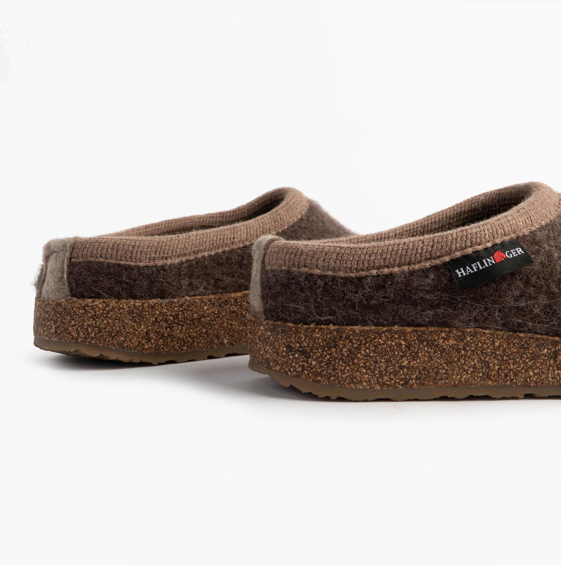 Haflinger PANDA Womens Felt Clogs Brown side view showcasing textile upper and rubber cork sole.