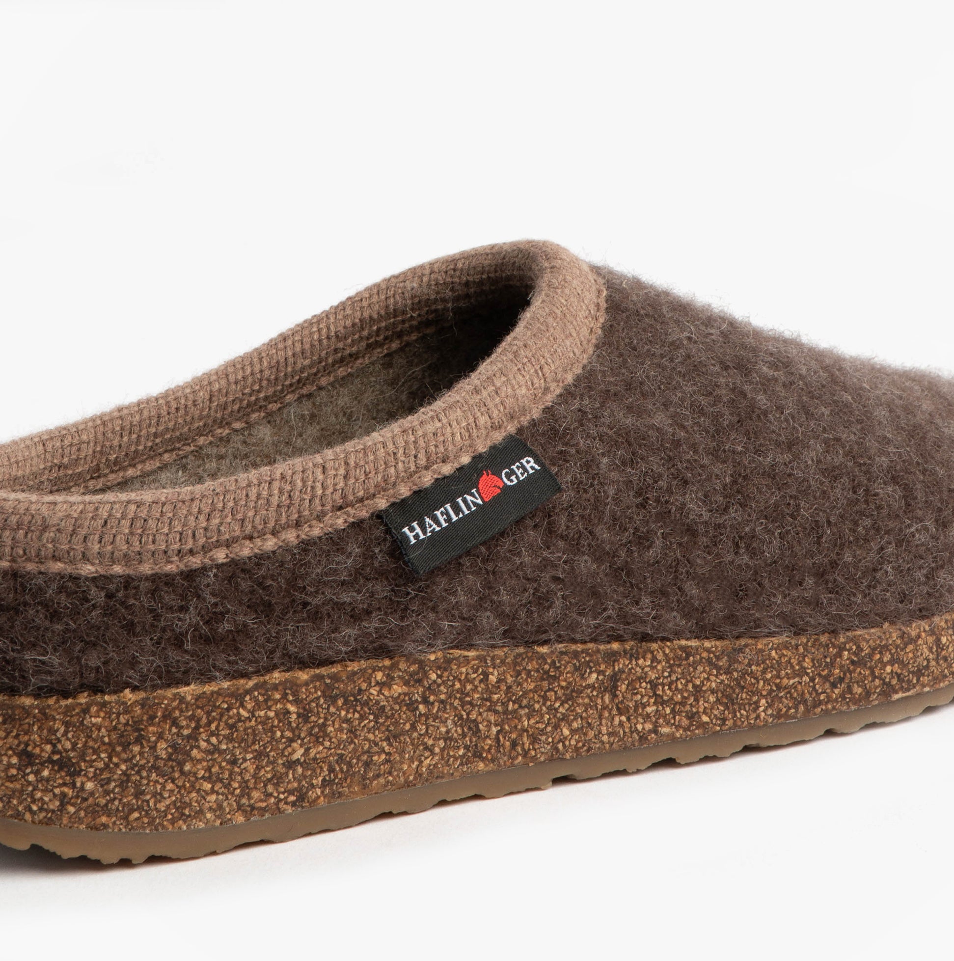 Haflinger PANDA Womens Felt Clogs Brown side view showcasing textile upper, rubber cork sole, and slip-on design.