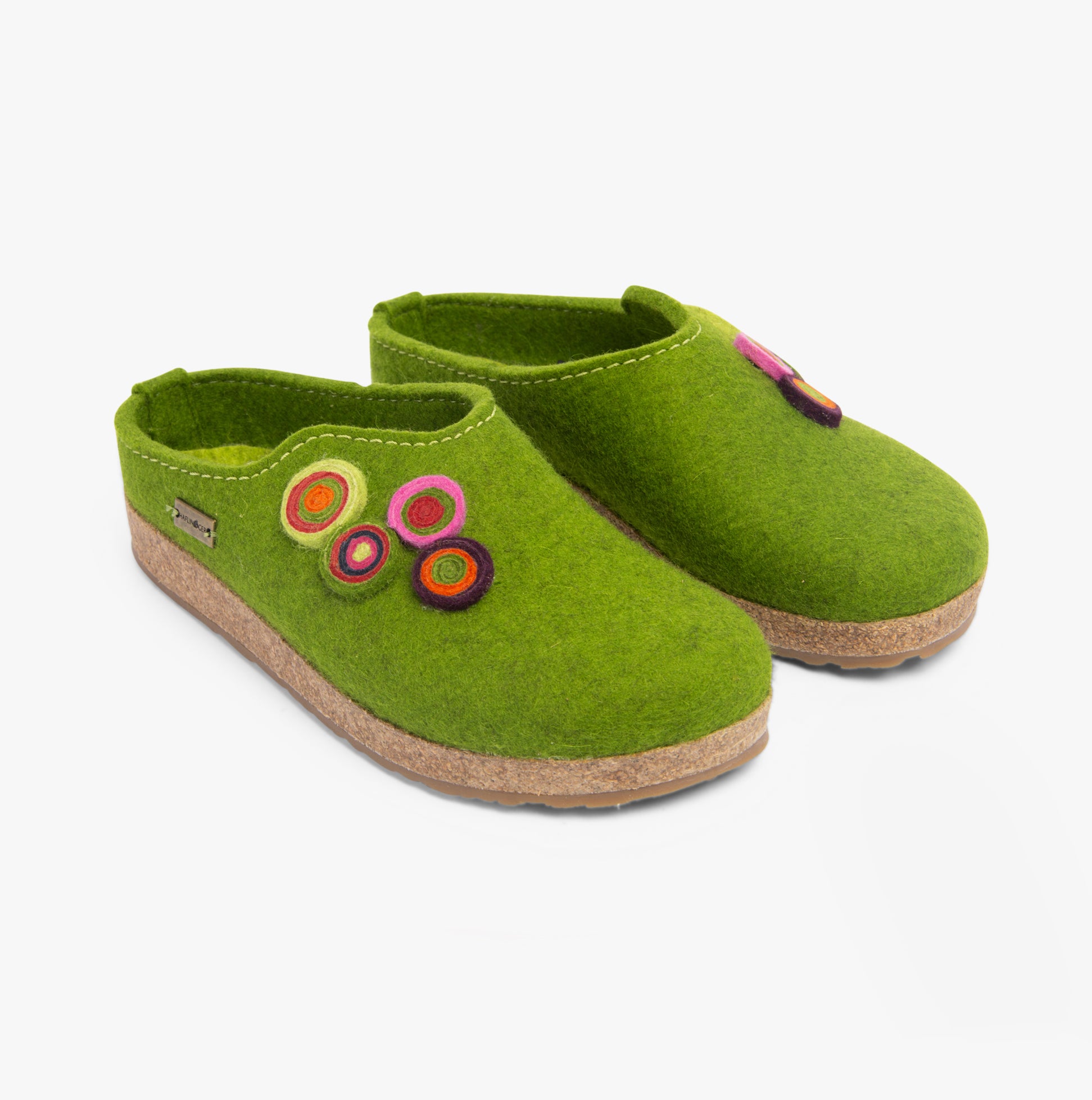 Haflinger KANON Womens Slippers Green side view featuring round toe shape and colorful embellishments.