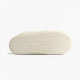 Jo & Joe GINGERBREAD Womens Mule Slippers Cream bottom view showing rubber sole and textured pattern.