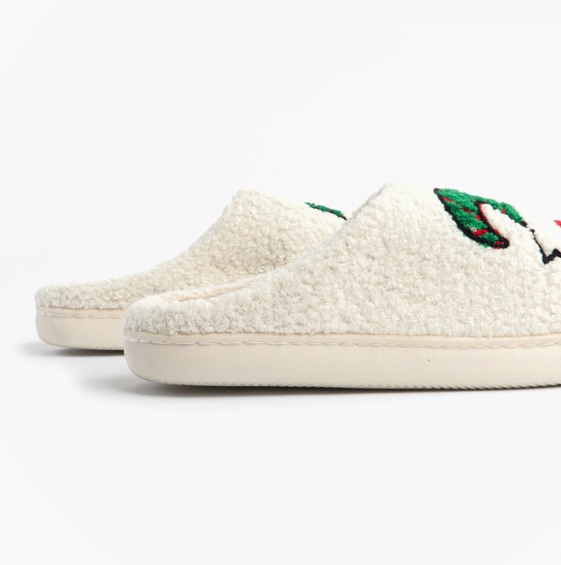 Jo & Joe GONK Womens Mule Slippers Cream side view showing soft fluffy texture and round toe.
