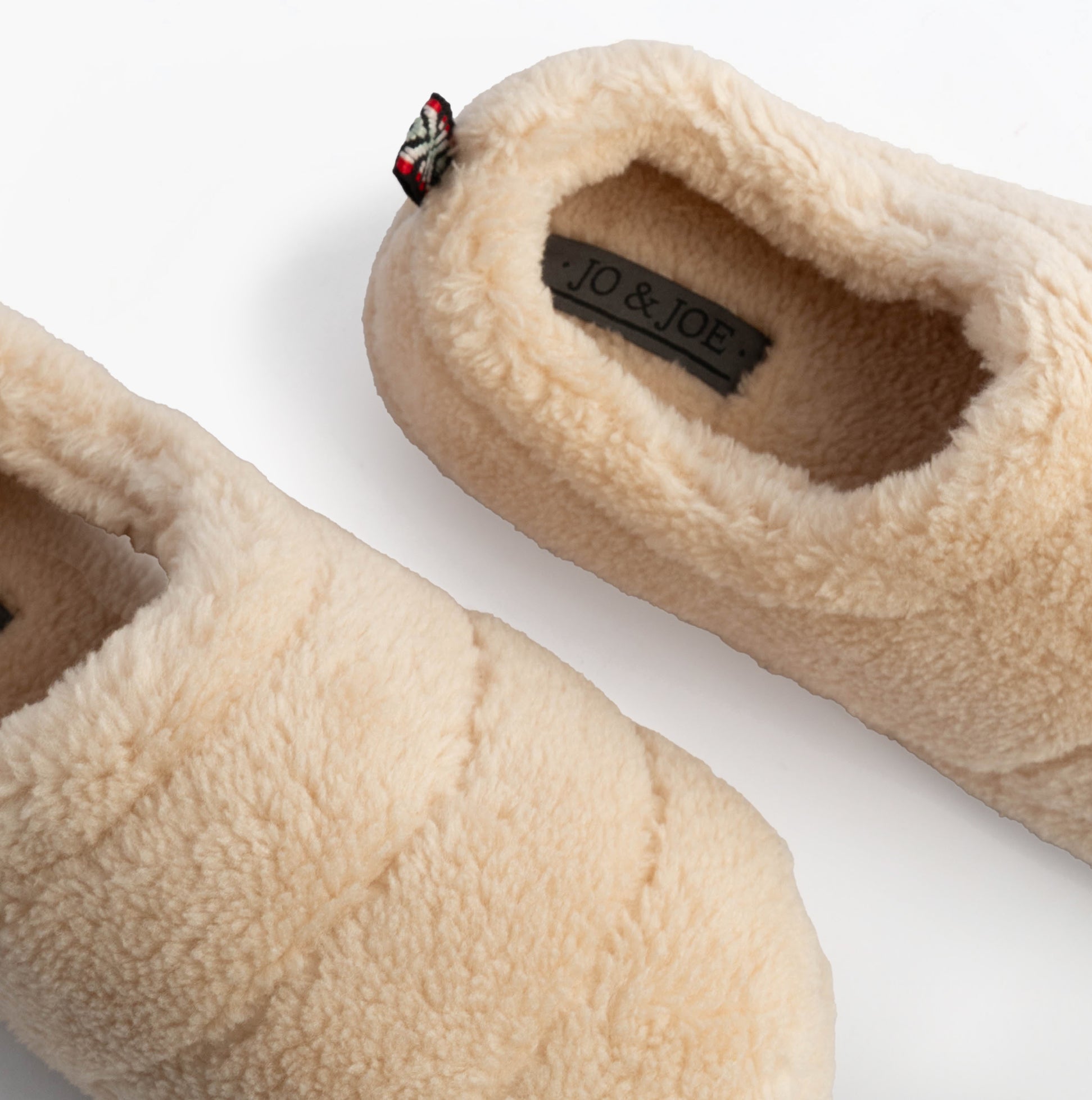 Jo & Joe HATTIE Womens Full Slippers Beige top view showing plush texture and slip-on design.