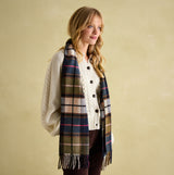 Joules LANGTREE Womens Scarf Green Pink Check front view on model with knitted sweater, showcasing checked pattern and tasselled ends.