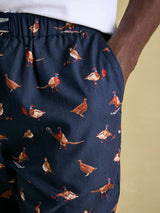 Joules DOZER Pyjama Bottoms Game Birds side view showing detailed bird patterns in navy fabric with side pockets.