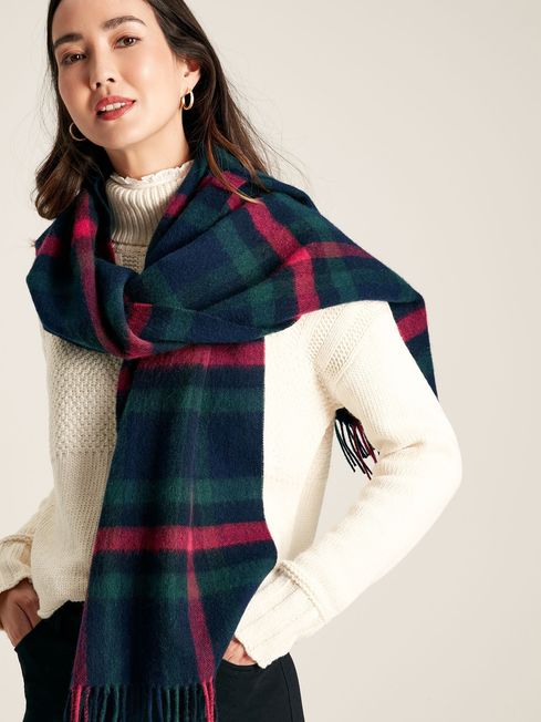 Joules LANGTREE Womens Scarf Navy Pink Check worn draped stylishly over shoulders, showcasing its heritage check pattern.