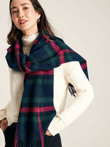 Joules LANGTREE Womens Scarf Navy Pink Check worn draped stylishly over shoulders, showcasing its heritage check pattern.
