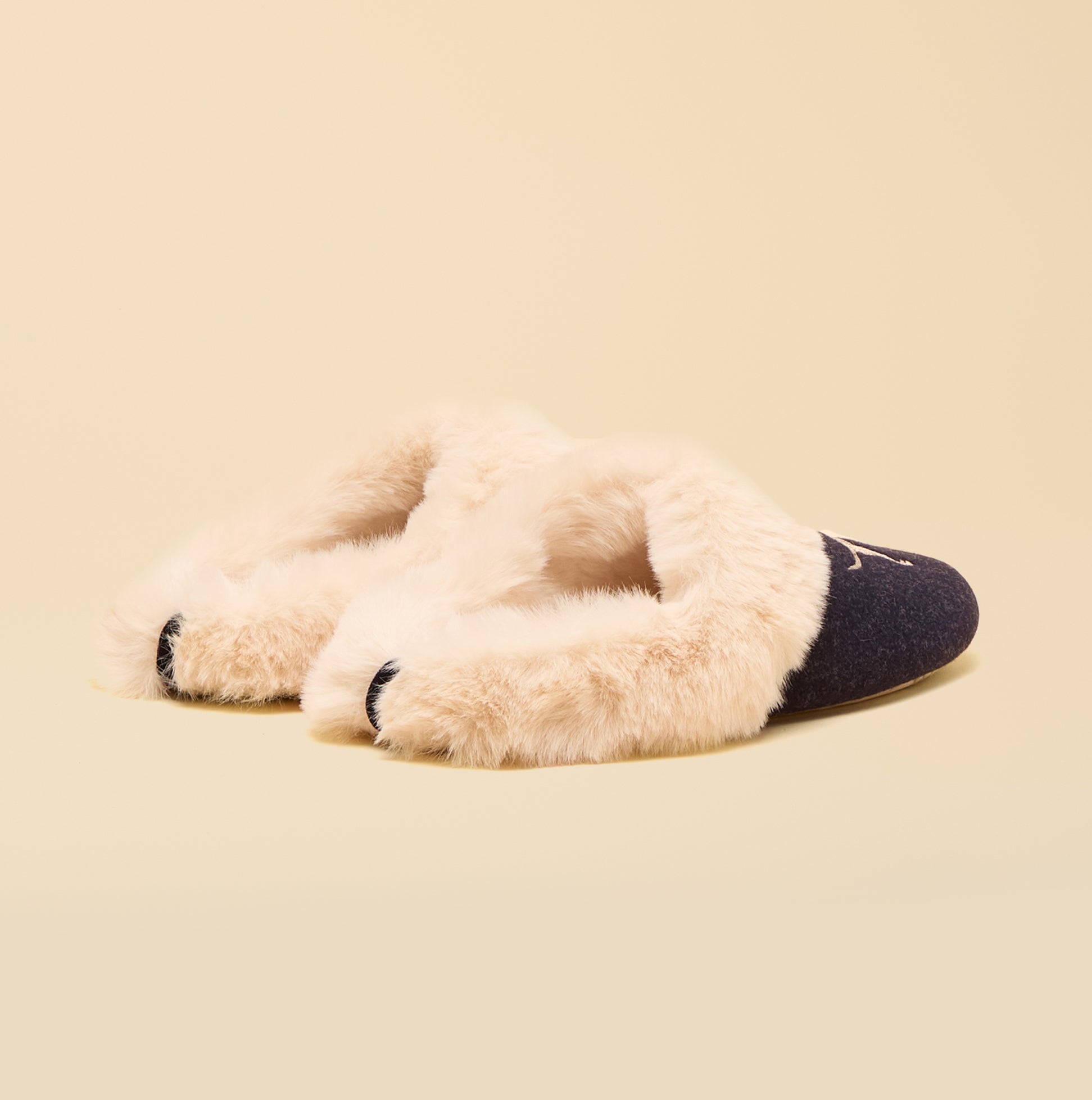 Joules SLIPPET Womens Mule Slippers Navy side view showing soft faux fur lining and slip-on design.