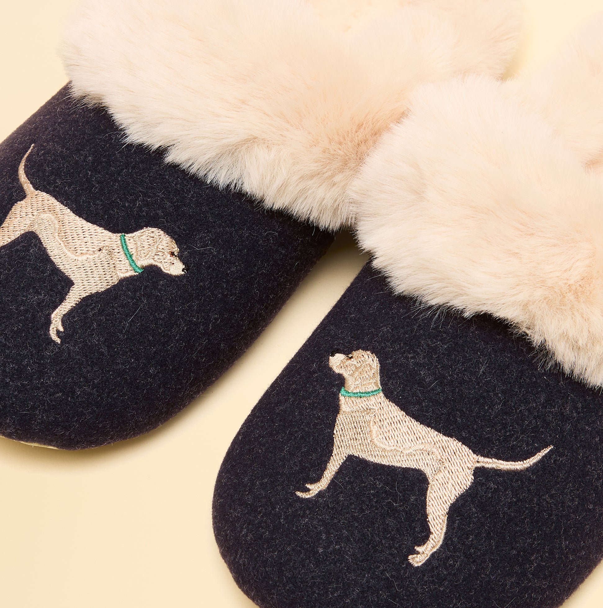 Joules SLIPPET Womens Mule Slippers Navy side view featuring dog embroidery and fluffy lining.