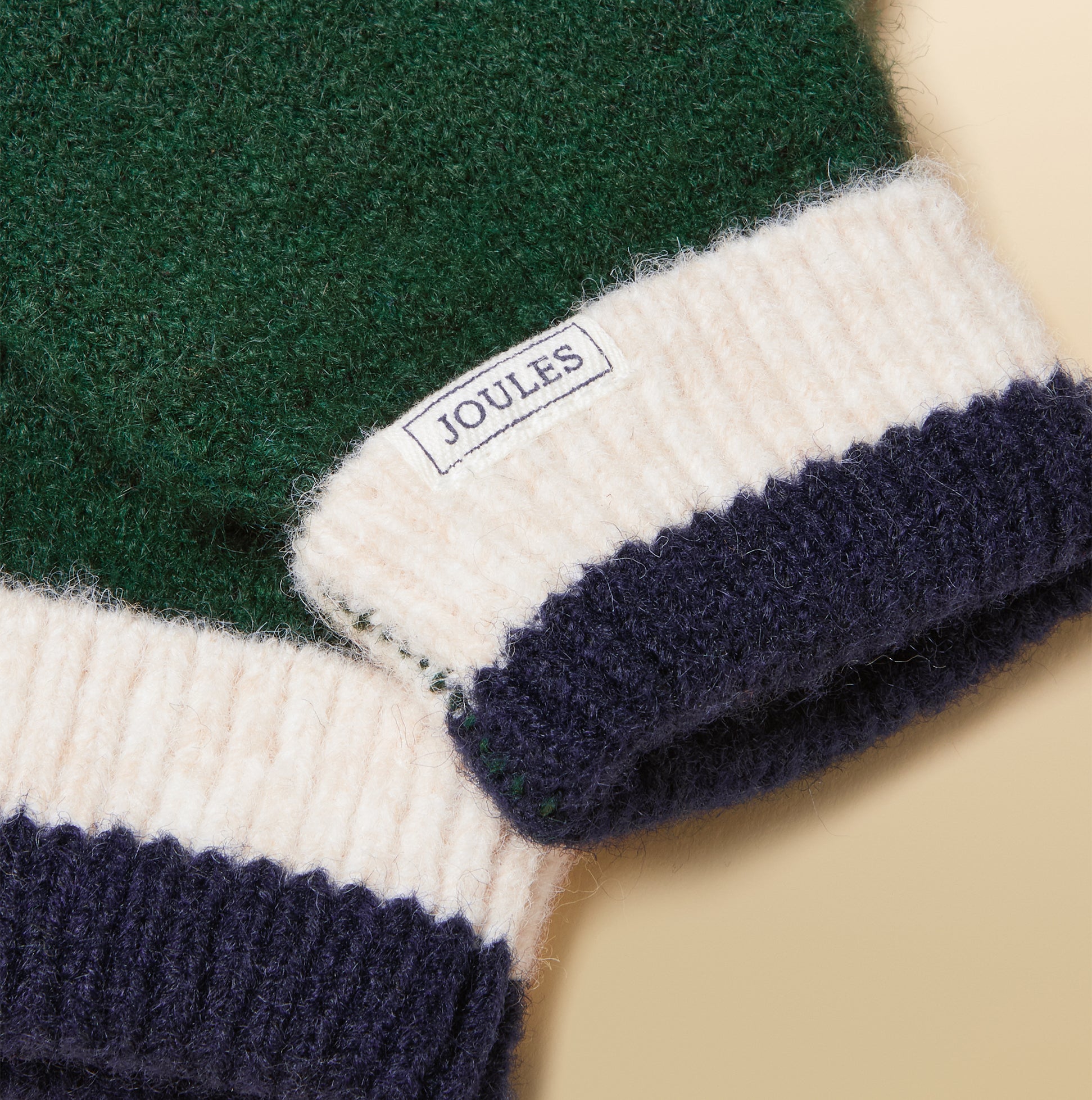 Joules POPLEY STRIPE Womens Gloves Green/Navy detail view showcasing label and cuff design.