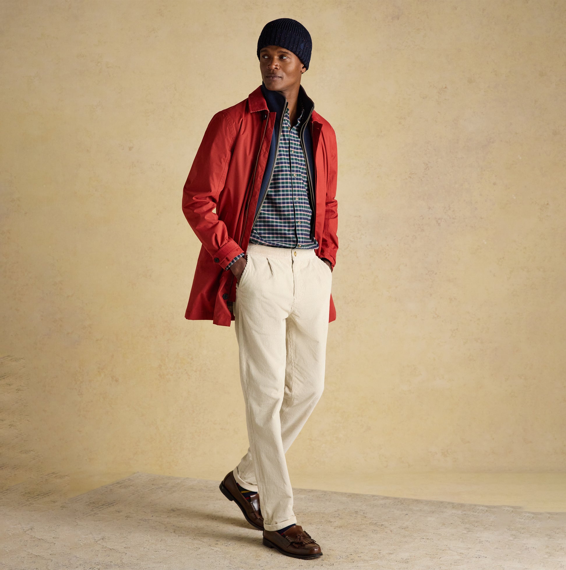 Joules HAMMOND Mens Beanie Navy worn with red jacket and checkered shirt, side view model pose.