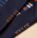 Joules KINGSBURY Mens Socks Navy/Ginger detail view showcasing fabric texture and logo design.