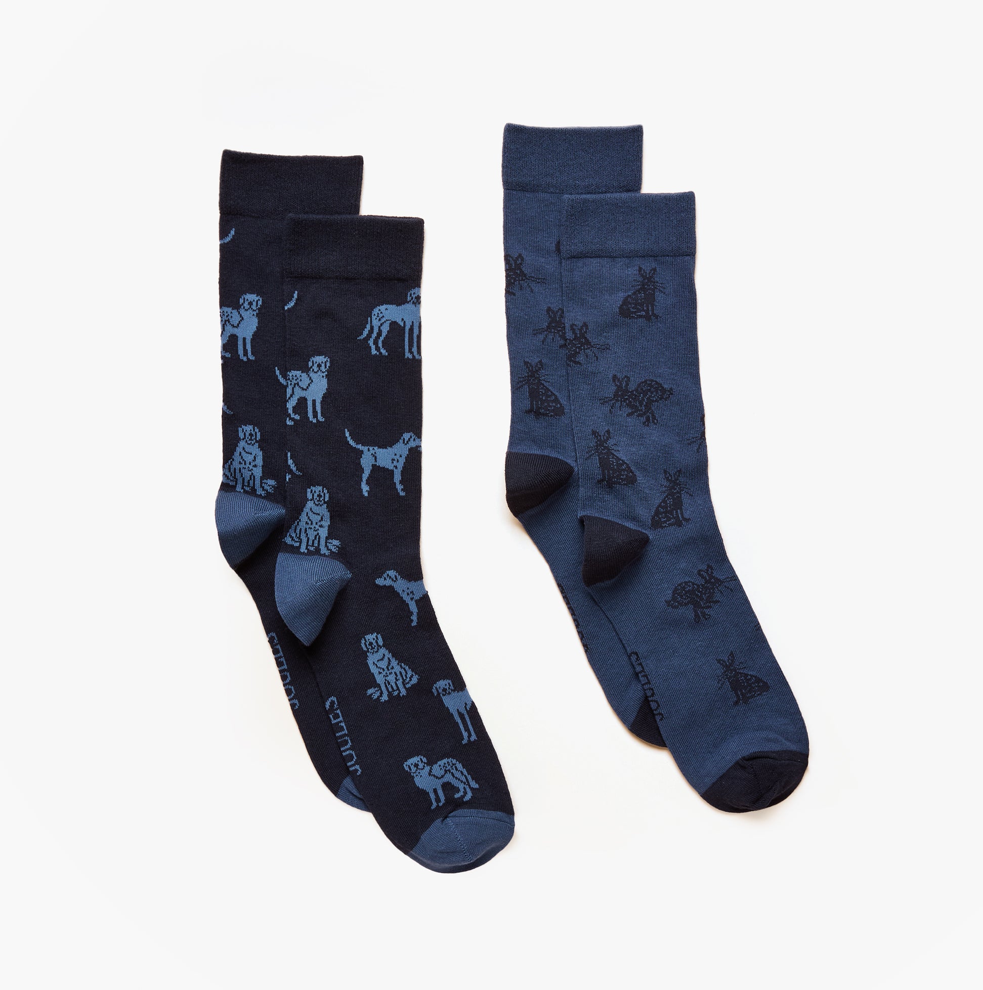 Joules KINGSBURY Mens Socks Blue - side view of blue crew socks with dog patterns on dark and light shades.