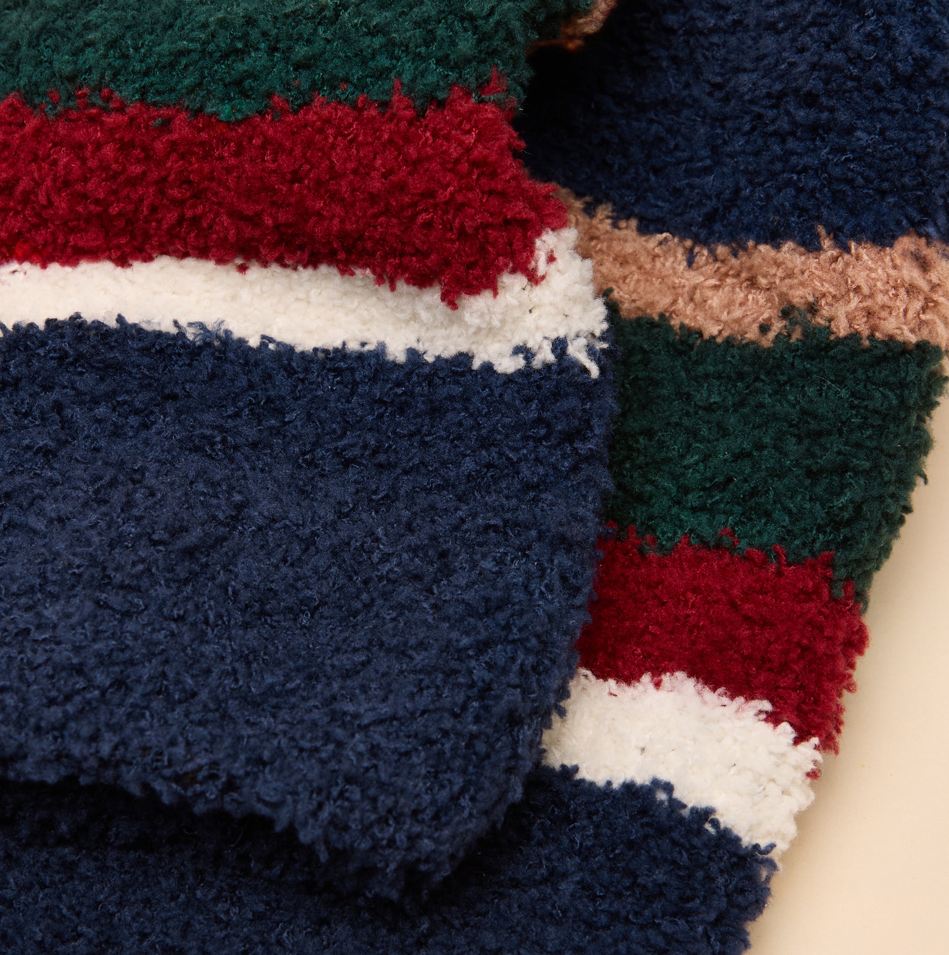 Joules FLUFFY Mens Socks Navy detail view showing soft, textured fabric with navy and multicolored stripes.