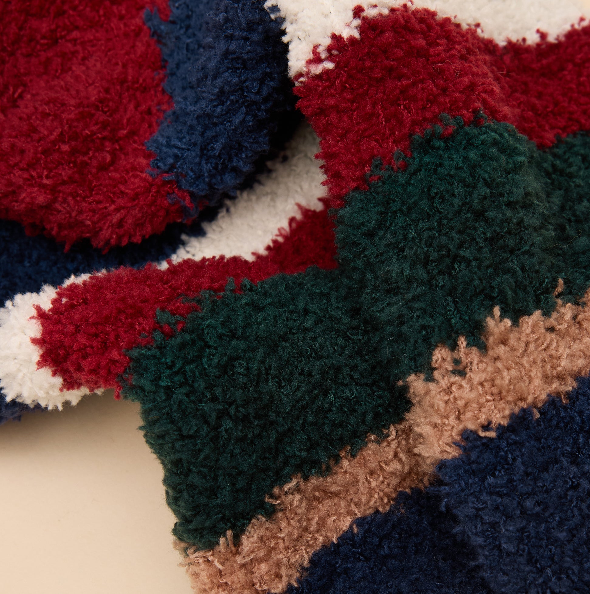 Joules FLUFFY Mens Socks Navy detail view showing soft texture and vibrant colors of red, navy, green, and cream.