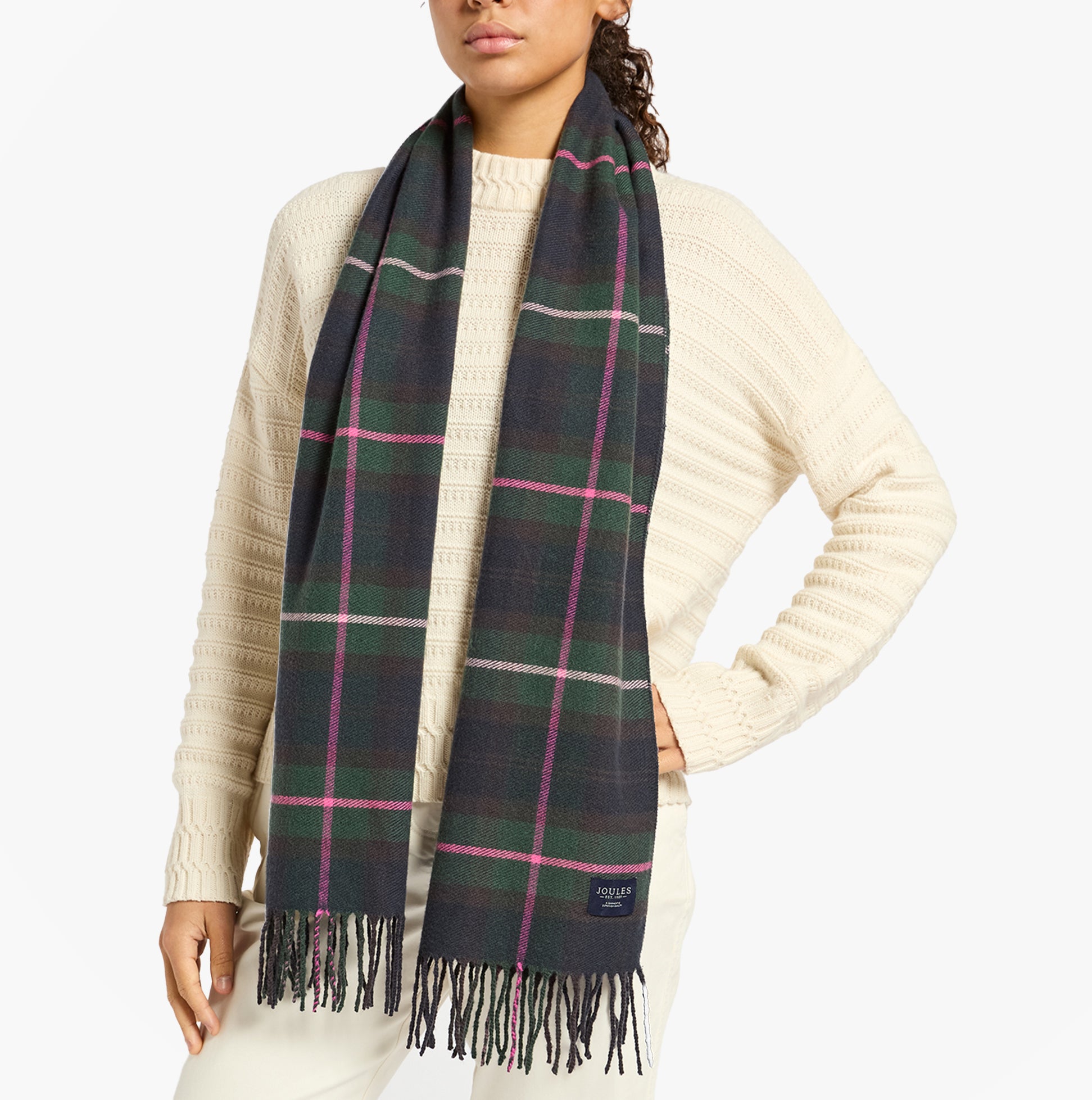 Joules LANGTREE Womens Navy/Pink Scarf front view worn by model with cream sweater, features fringe details.