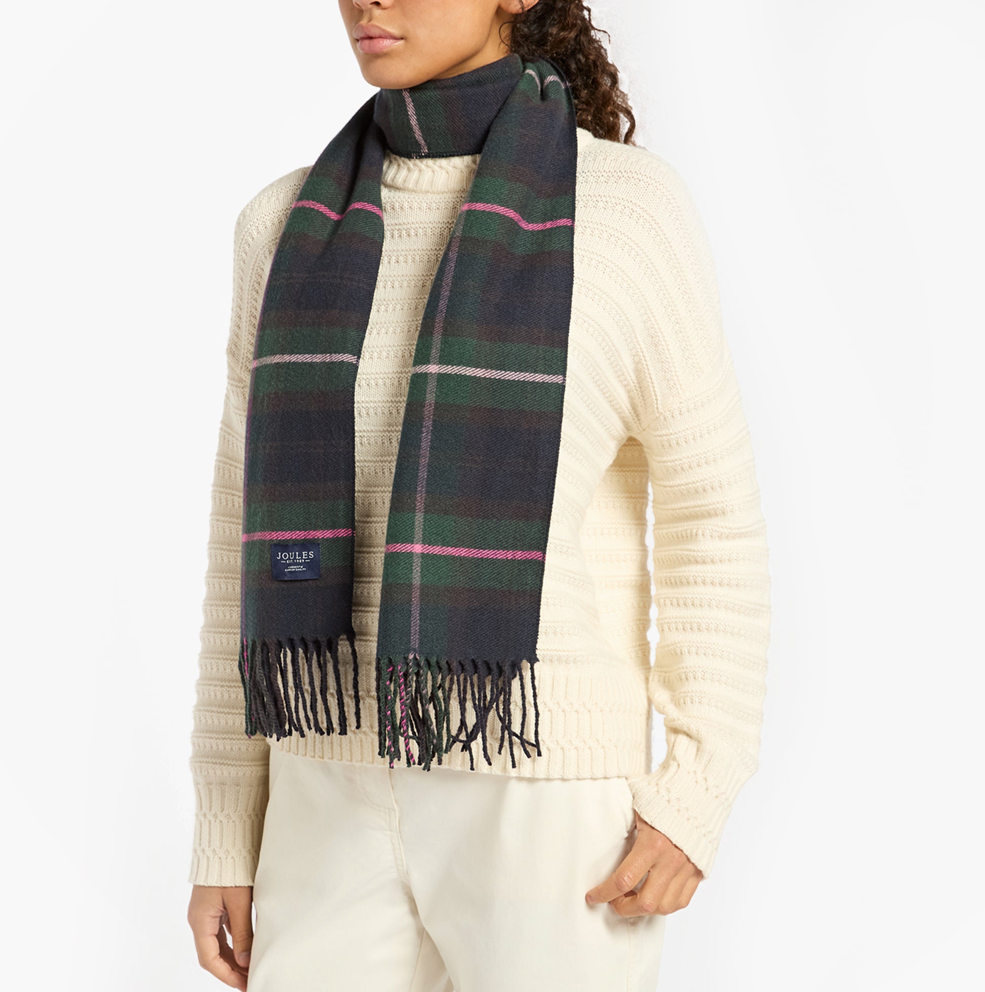 Joules LANGTREE Womens Navy/Pink Scarf draped on model, showcasing fringe detail and plaid pattern.