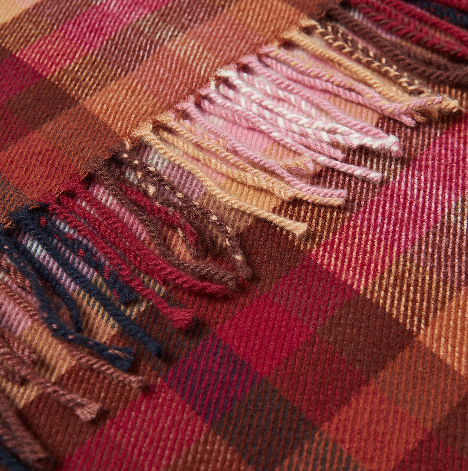 Joules LANGTREE Womens Winter Berry Red detail view showcasing colorful fringes and textured fabric patterns.