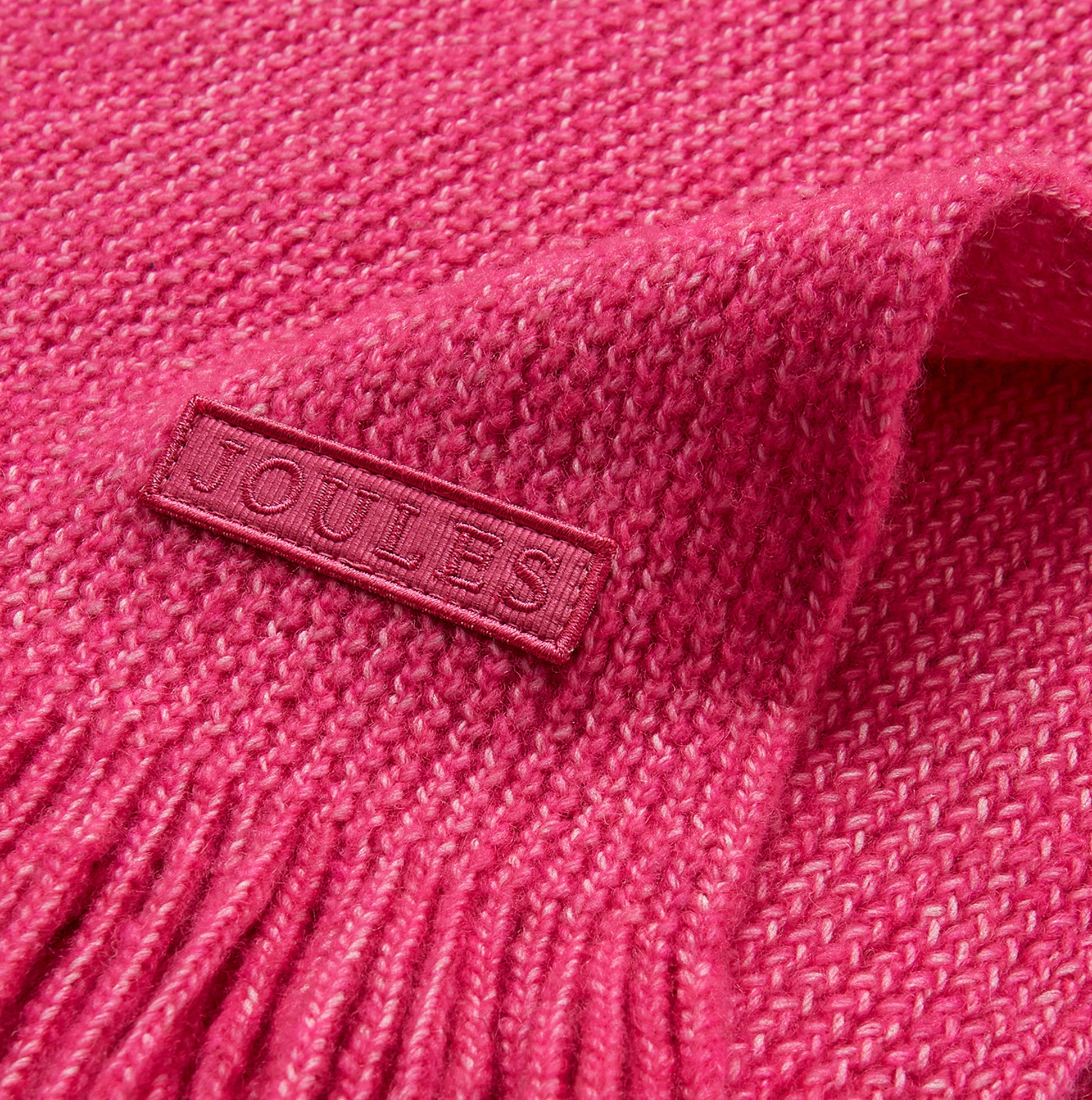 Joules ROSA Womens Winter Pink detail view featuring logo tag on soft pink fabric.