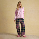 Joules STELLA Womens Pyjama Bottoms Navy/Khaki front view with relaxed fit and cotton material, styled with a pink top.