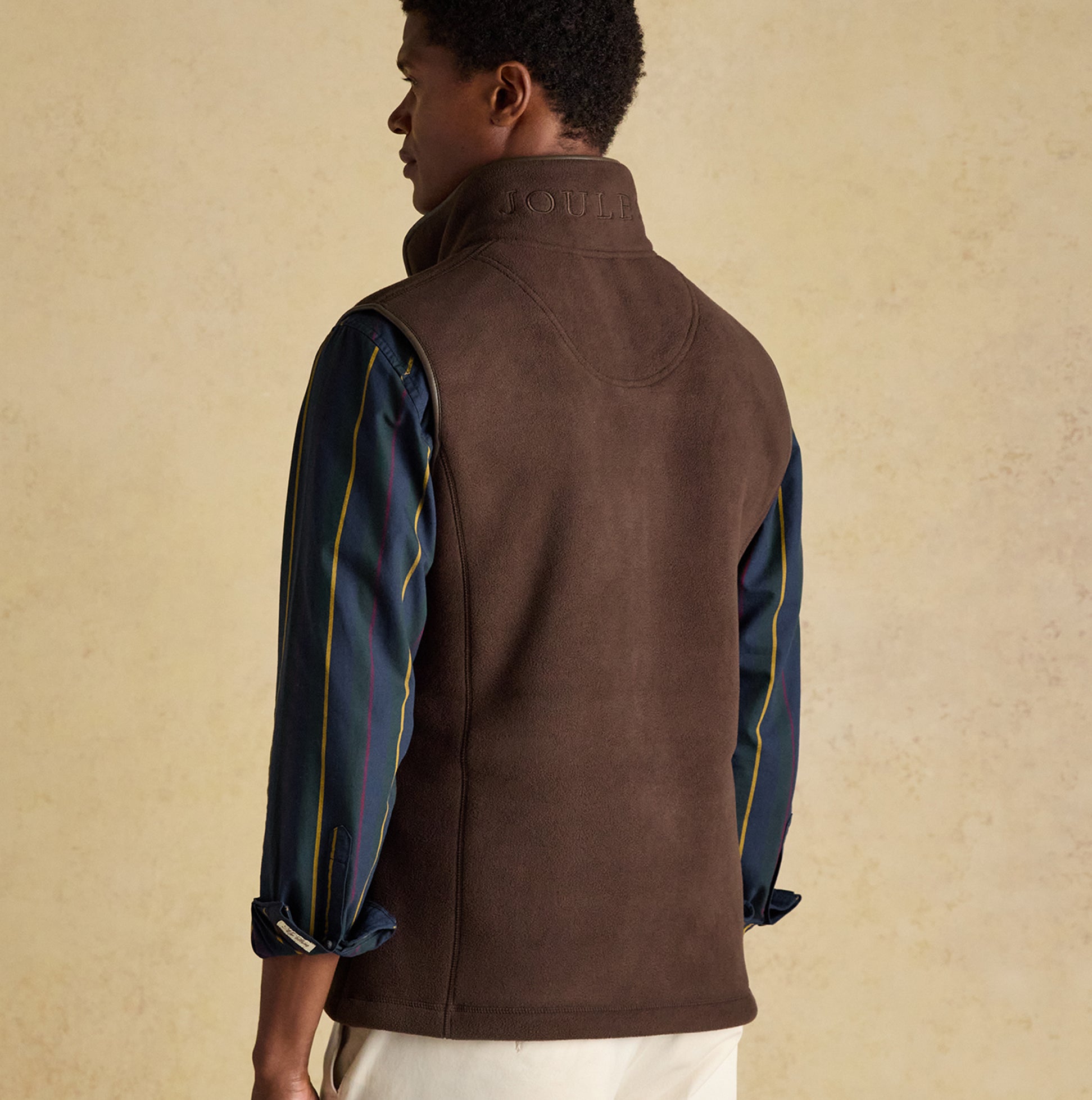 Joules HERITAGE FLEECE Mens Gilet Brown back view, showing sleeveless design and two-way zip fastening.
