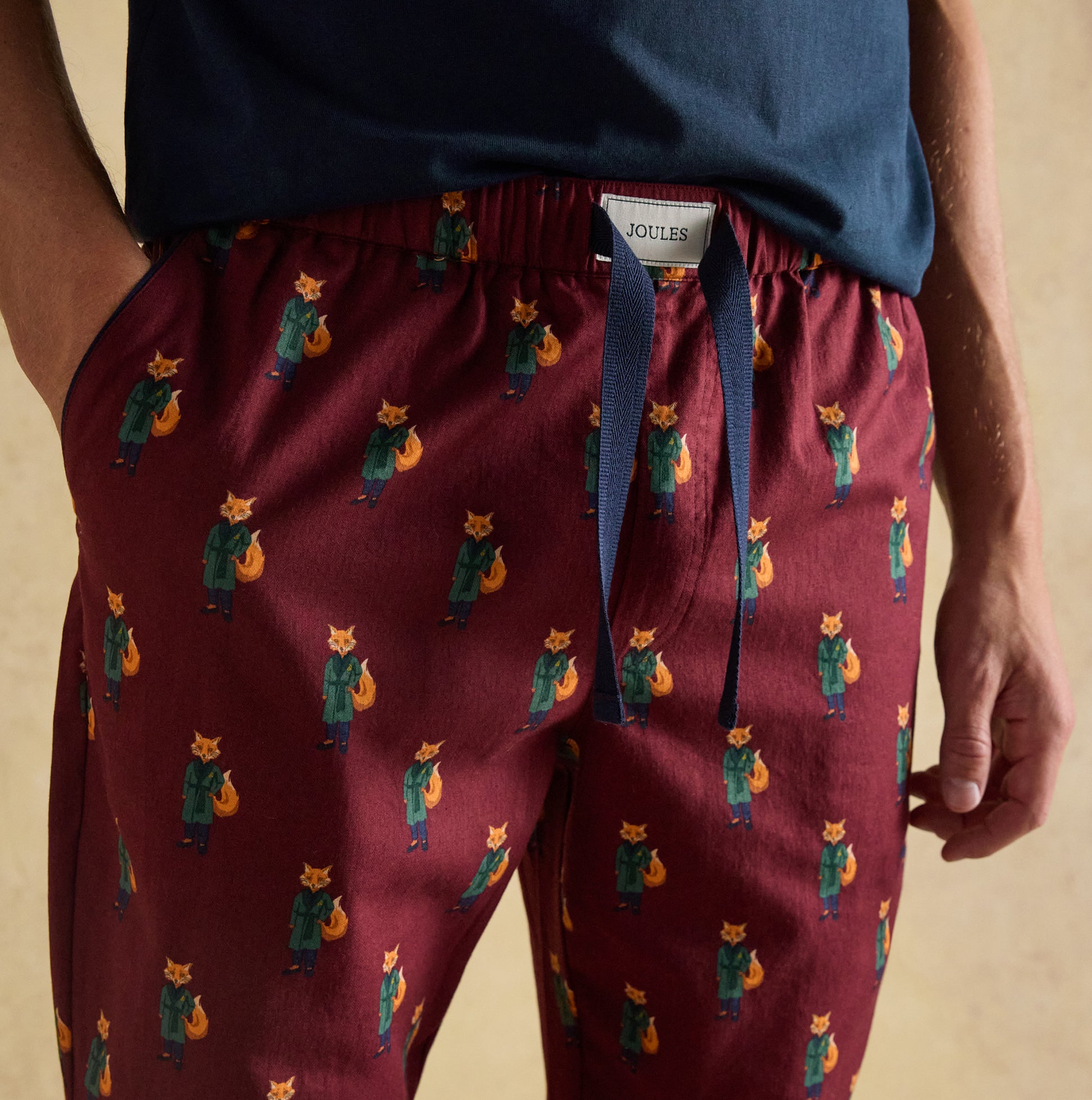 Joules DOZER Mens Pyjama Trousers Burgundy Red front view with fox print, 100% cotton, relaxed fit loungewear.