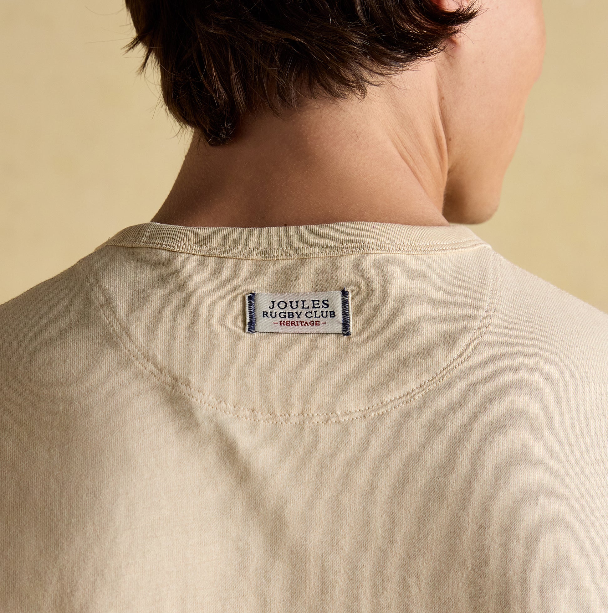 Joules RUGBY CLUB TEE Mens T-Shirt Cream back view showcasing the collar and tag details.