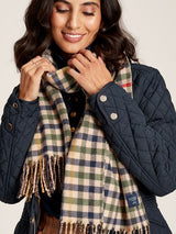 Joules LANGTREE Womens Scarf Henson Check front view, model wearing scarf with tasselled ends and heritage check pattern.