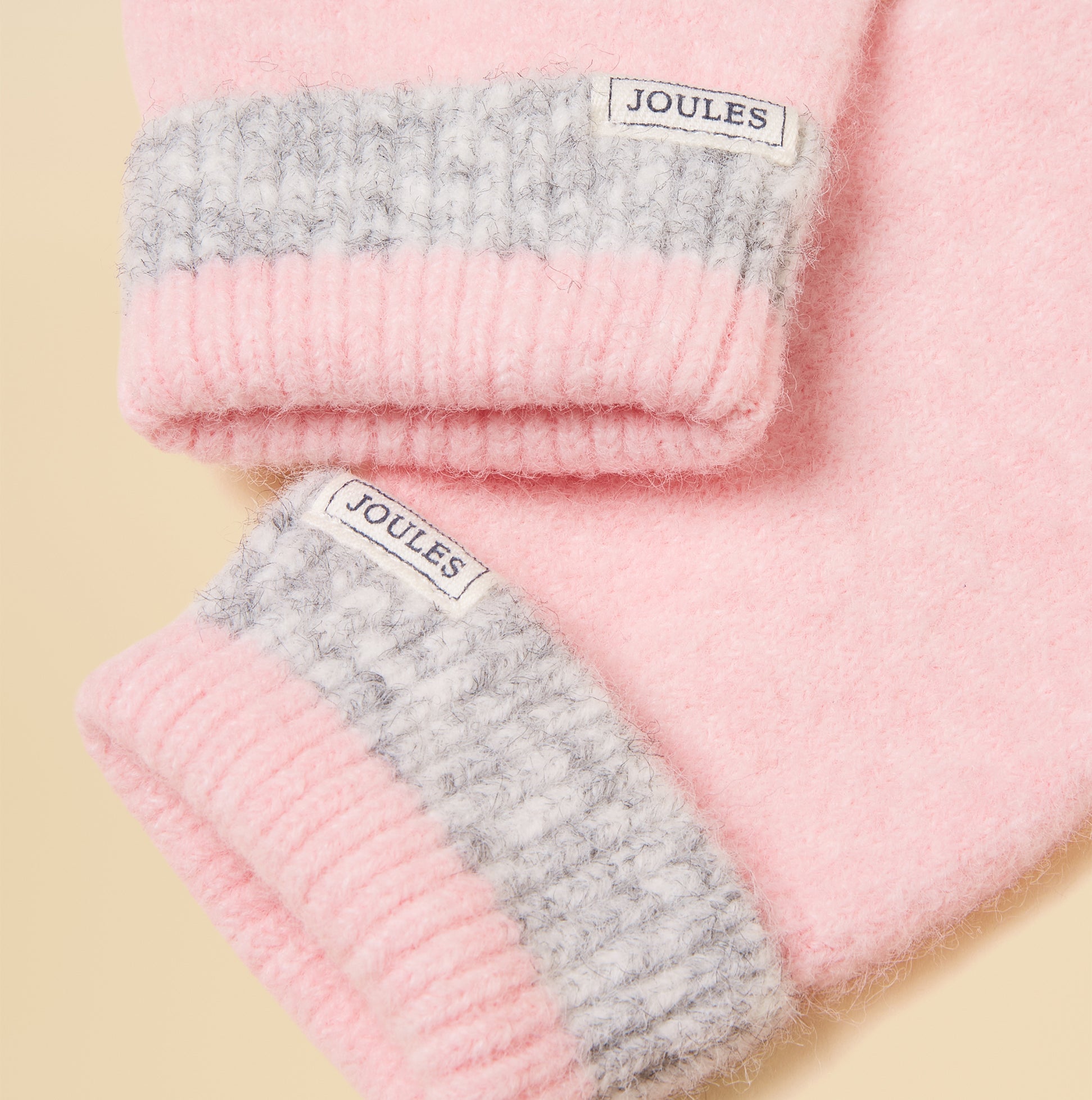 Joules POPLEY STRIPE Womens Gloves Pink/Grey detail view of pink and grey knit cuffs with brand labels