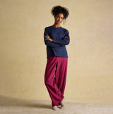 Joules JERSEY Pyjama Top Womens Sweatshirts Navy front view, paired with pink striped pants, model standing.