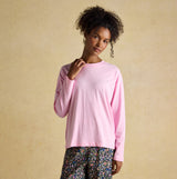 Joules JERSEY Pyjama Top Womens Sweatshirts Pink front view, featuring a model wearing a long sleeve cotton top.