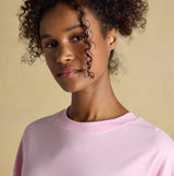 Joules JERSEY Pyjama Top Womens Sweatshirts Pink front view model wearing sweatshirt with curly hair.