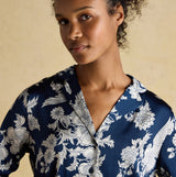 Joules BONNIE Womens Pyjama Set Navy Floral detail view showcasing floral pattern and fabric texture.