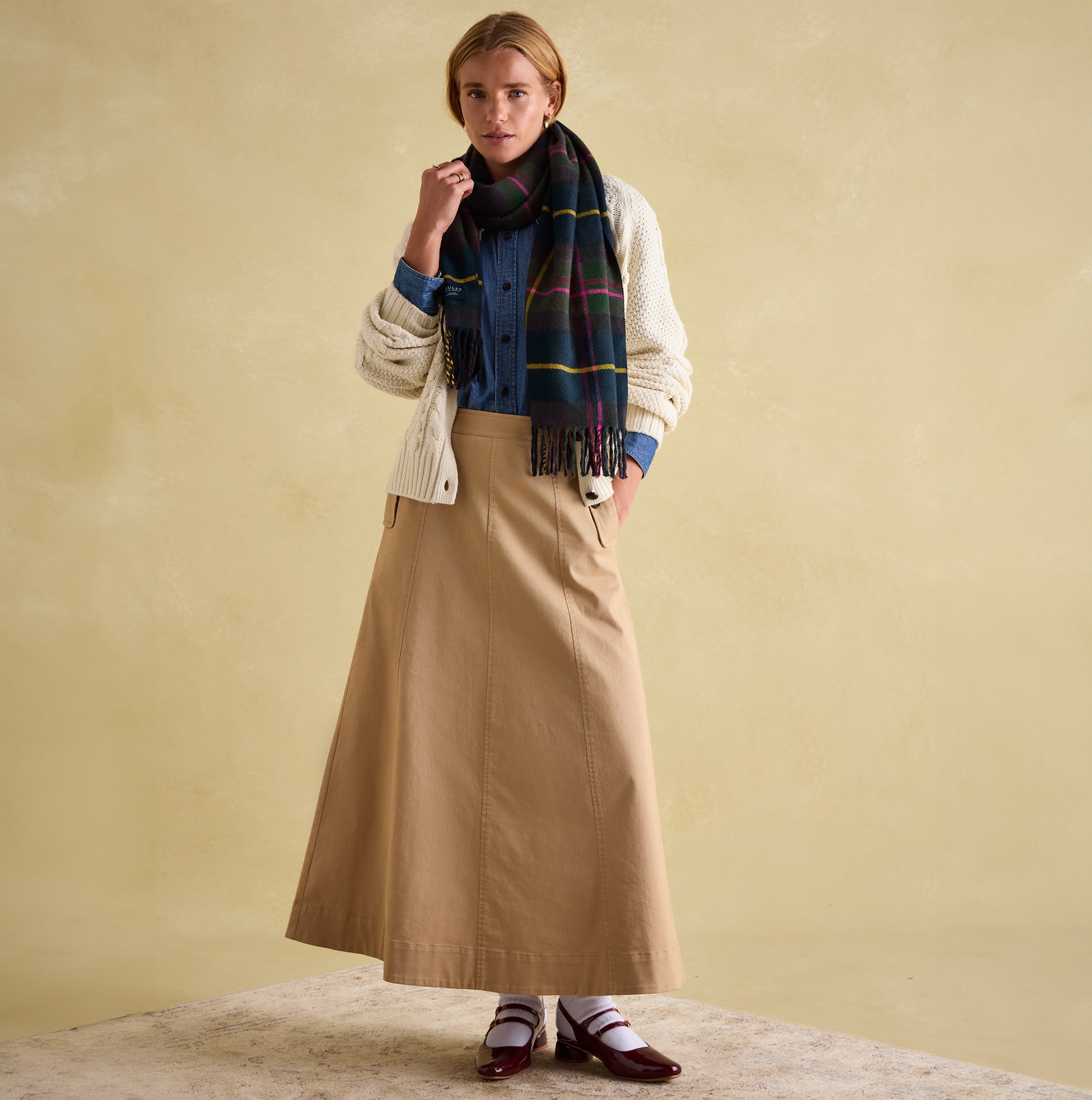 Joules LANGTREE Womens Scarf Navy Check worn with a denim shirt and long skirt, front view showcasing style and color details.