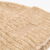 Joules CAVERSHAM Womens Beanie Oat detail view showing brand label and texture of the material.