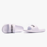 Lacoste SERVE SLIDE 1.0 124 2 Mens Slides White/Black side view showcasing the slip-on design and logo.